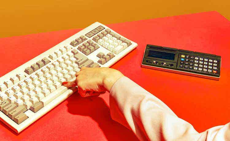 how AI can help you with your finances vintage style keyboard